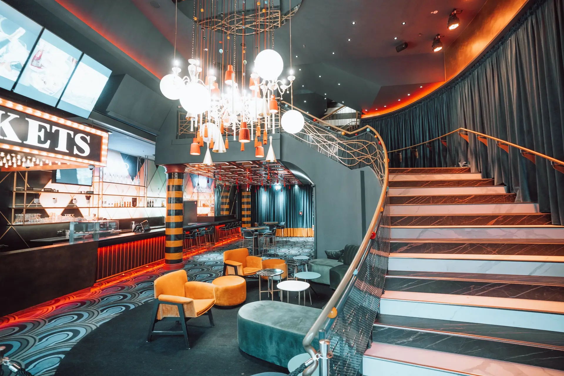 Luxurious bar interior with grand staircase